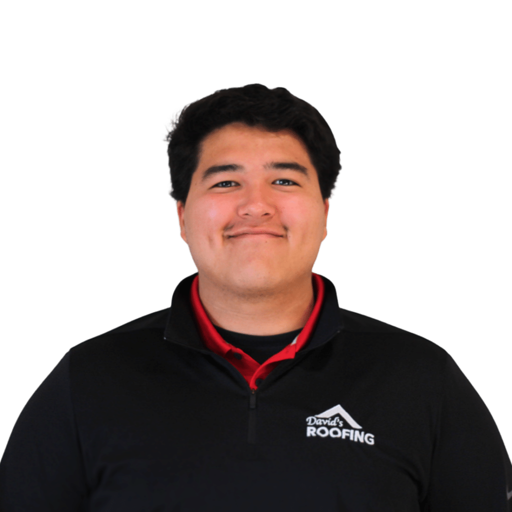 Smiling person wearing a black jacket with a roofing company logo on a green background.