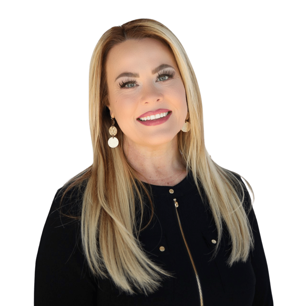 Smiling person with long blonde hair in a black top, wearing gold earrings, on a plain background.